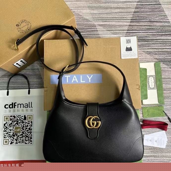 G*u*i top handle bags